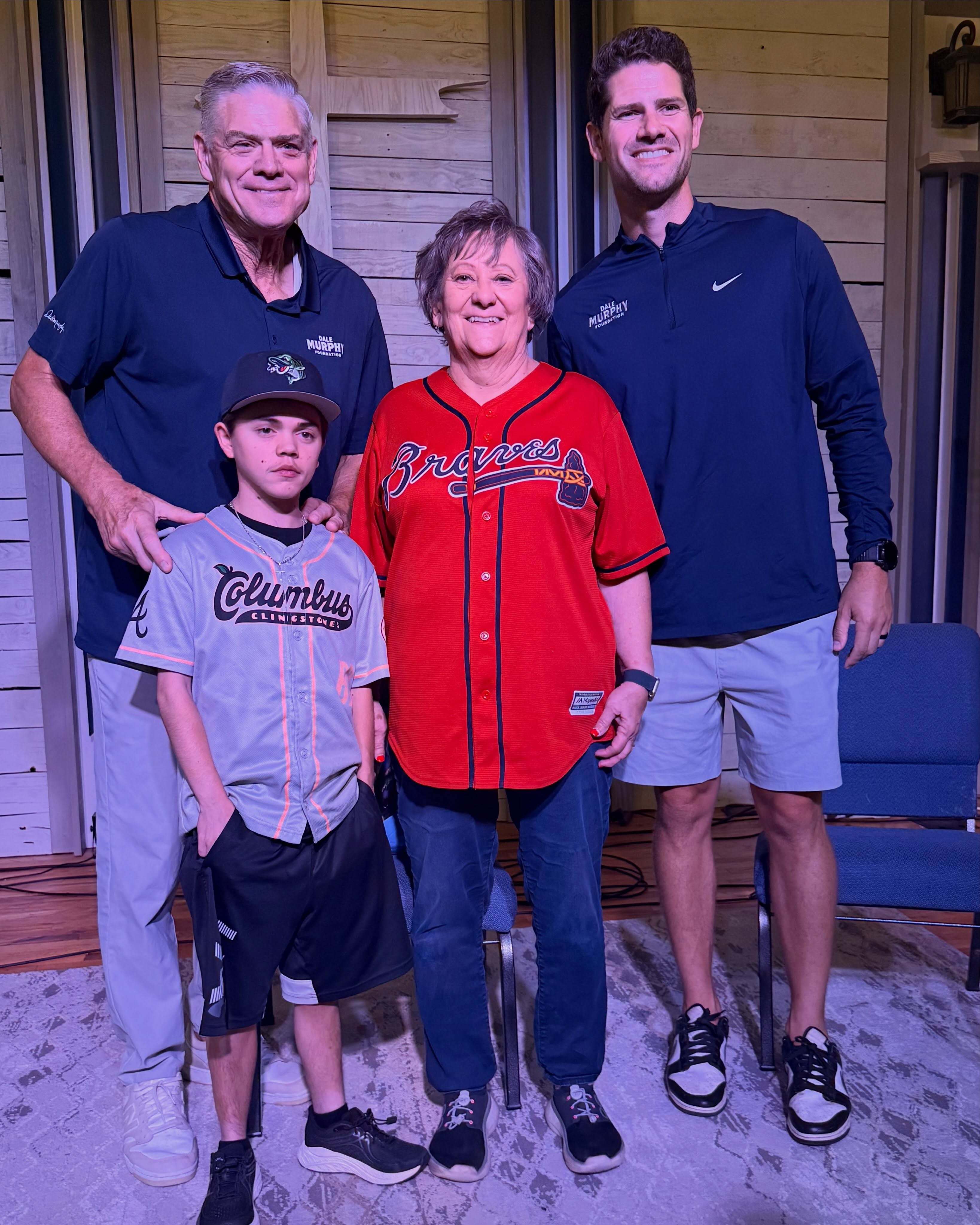 Dale Murphy, Hunter Moore, his grandmother Theresa, and a Dale Murphy Foundation representative at the scholarship recognition