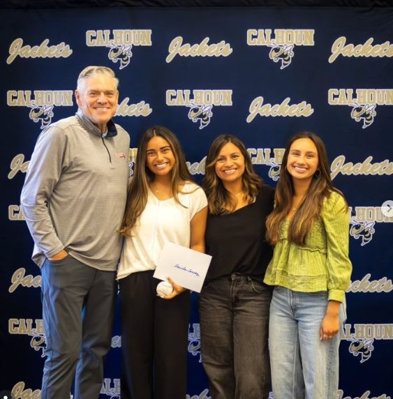 Dale Murphy presenting the Character Scholarship to Daniela, a Calhoun High School graduate