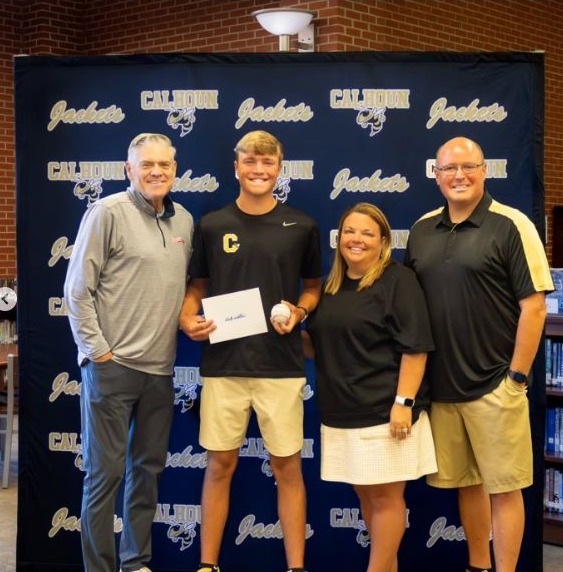 Dale Murphy presenting the Character Scholarship to Kirk, a Calhoun High School graduate